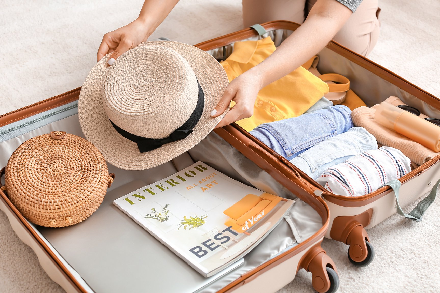 Woman Packing Suitcase