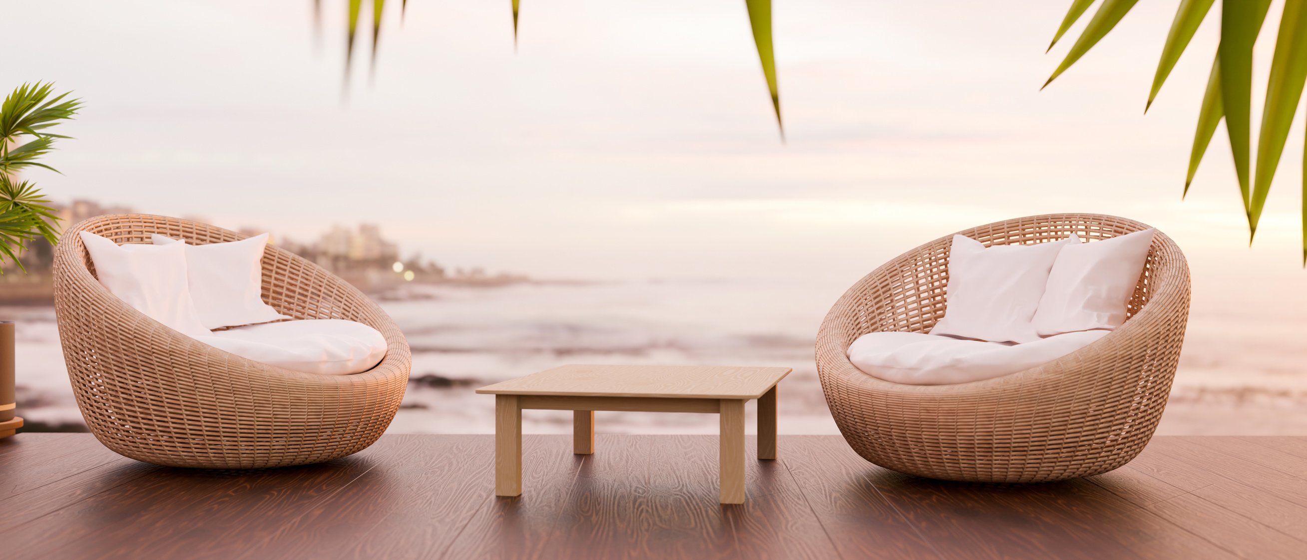 Two wicker round chair, beach view